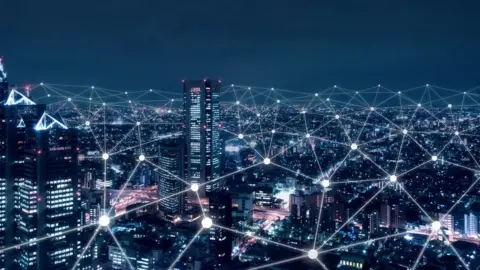 Getty Images Cityscape with connected nodes