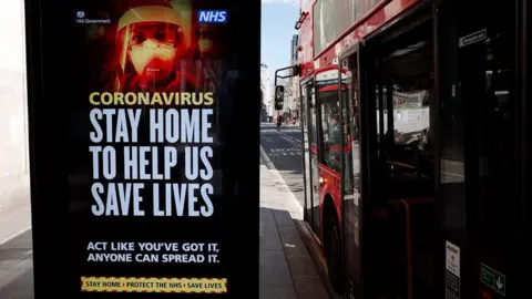 Getty Images A government coronavirus advert at a bus stop