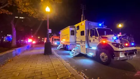AFP A police truck is parked near the National Assembly of Quebec, in Quebec City, early on 1 November, 2020.