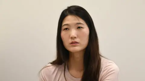 Getty Images Former South Korean tennis player Kim Eun-hee speaking during an interview with AFP in Seoul