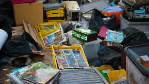 Flood-damaged items inside school