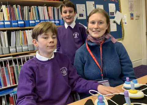 Theo, Ollie and Cecily with Code Jumper