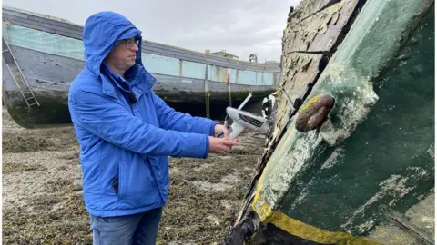 Dr Andrew Turner Xrays a rotting boat