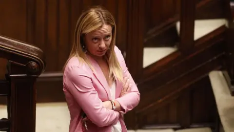 Getty Images Fratelli d'Italia rightist opposition party's leader Giorgia Meloni in the Chamber of Deputies in Rome on 21 July