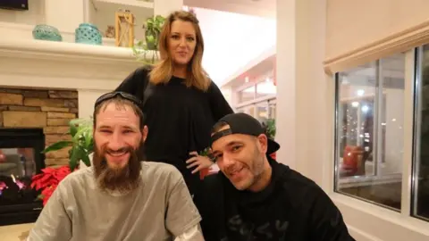 David Swanson/ Philadelphia Inquirer The couple with the homeless man