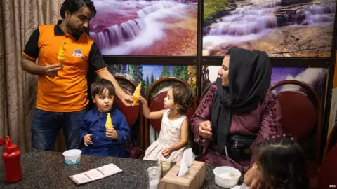 Family in Afghanistan enjoying ice cream