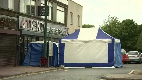 BBC Police forensics tent on Upper High Street