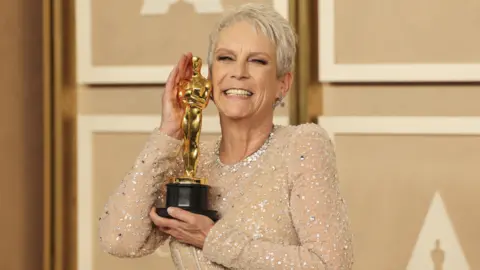 Reuters Jamie Lee Curtis wins the Oscar for Best Supporting Actress for "Everything Everywhere All at Once" during the Oscars show at the 95th Academy Awards in Hollywood, Los Angeles, California