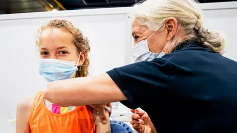 Getty Images Child being vaccinated in the Netherlands