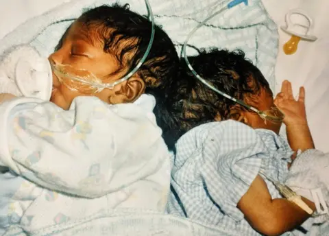 Mowatt family Sanchia and Eman shortly after they were born