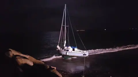RNLI Washed up yacht