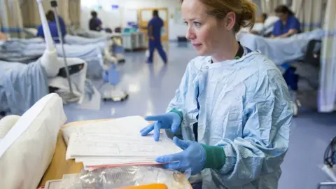 Science Photo Library Female surgeon