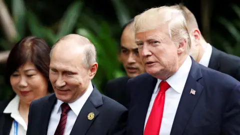 Reuters File photo: Donald Trump and Vladimir Putin in 2017