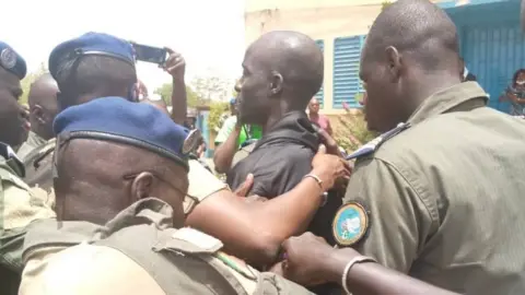 Alkuma Baye Modou Fall upon his arrival at the gendarmerie