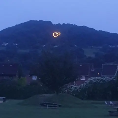 Uldis Balodis Glowing heart on Cooper's Hill