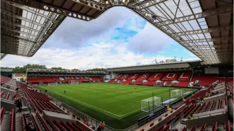 PA Media Photo of empty stands and pitch in Ashton Gate Stadium