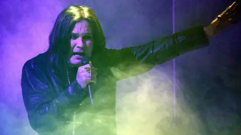 Getty Images Ozzy Osbourne on stage at the American Music Awards in November 2019