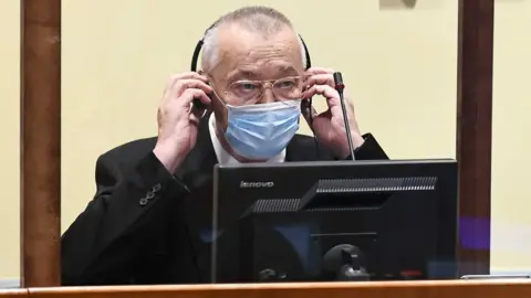 EPA Franko "Frenki" Simatovic, appears in court at the UN International Residual Mechanism for Criminal Tribunals (IRMCT) in The Hague, Netherlands, 30 June 2021,