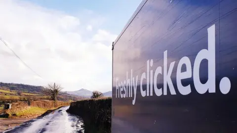 Bromyard Travel Services Jason working as a delivery driver for Tesco