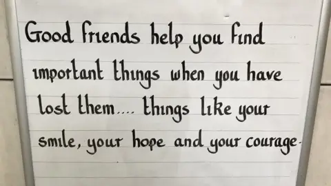 @Oval_station Inspiring message at the Oval station which says: Good friends help you find important things when you have lost them... things like your smile, your hope and your courage