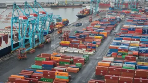 Getty Images Containers being loaded at Liverpool docks