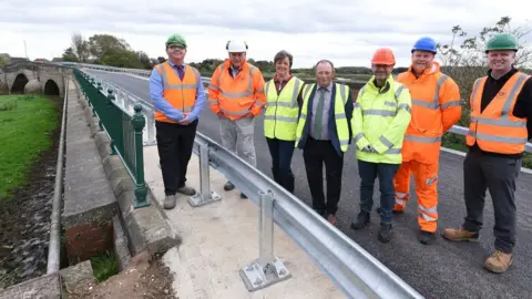 East Riding of Yorkshire Council East Riding of Yorkshire Council officials on the newly-repaired Bubwith bridge (2023)