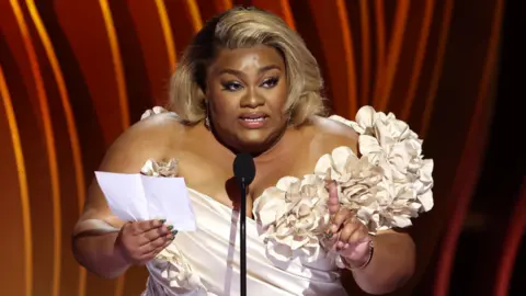 Getty Images Da'Vine Joy Randolph accepts the Outstanding Performance by a Female Actor in a Supporting Role award for "The Holdovers" onstage during the 30th Annual Screen Actors Guild Awards at Shrine Auditorium and Expo Hall on February 24, 2024 in Los Angeles, California.