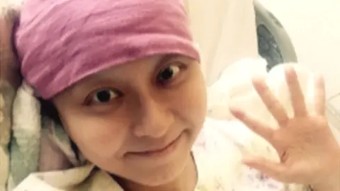 Mao Kobayashi Mao Kobayashi waving from a hospital bed