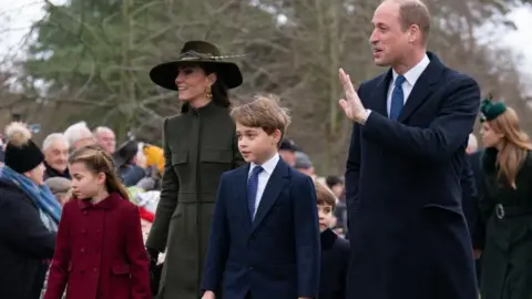 PA Media The Prince and Princess of Wales and their children greeting crowds at Sandringham