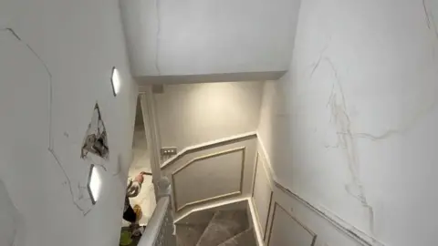 Luke Ansell Wall damage