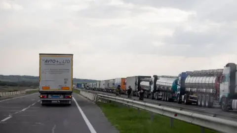 Getty Images A queue of lorries waits to cross from Ukraine into Poland