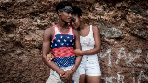 Getty Images Young couple leaning on to each other on Sunday 6 October 2019