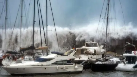 Getty Images Storm Gloria Waves surge into Barcelona's Olympic Marina