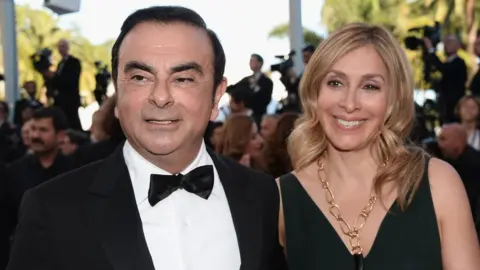 Getty Images Carlos Ghosn and his wife Carole Ghosn at Cannes Film Festival in 2016