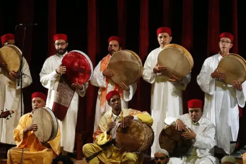 EPA Tunisian members of the group El Hadhra Chants Soufis perform during the Festival de La Medina at the Municipal Theater in Tunis, Tunisia, 06 June 2017