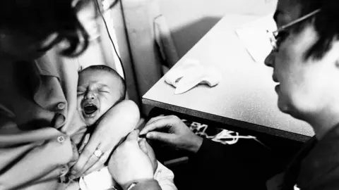 Getty Images Baby being given a BCG jab