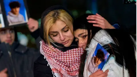 Getty Images Mourners of flight PS752 victims