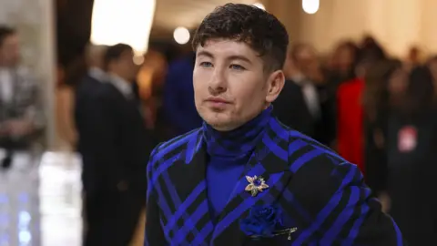 Reuters Barry Keoghan poses at the Met Gala, an annual fundraising gala held for the benefit of the Metropolitan Museum of Art's Costume Institute with this year's theme "Karl Lagerfeld: A Line of Beauty", in New York City, New York, U.S., May 1, 2023