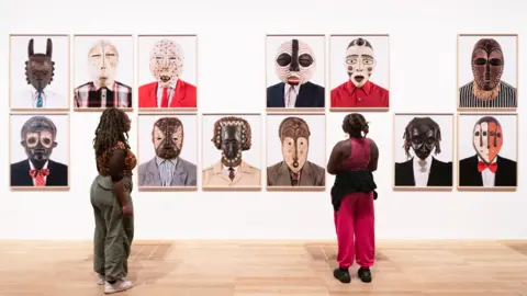 Tate/Lucy Green Installation view of Angolan photographer Edson Chagas's Tipo Passe (2014) at the Tate Modern