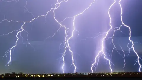 Science Photo Library Lightning storm