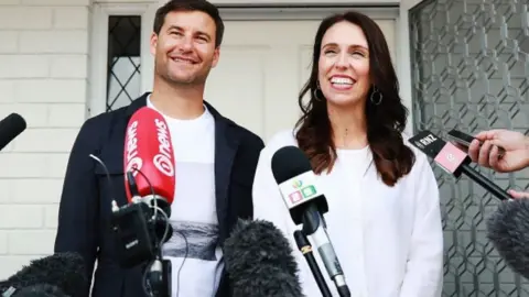 New Zealand's Prime Minister Jacinda Ardern with partner Clarke Gayford