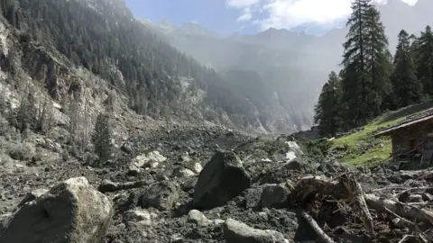 AFP Rubble from landslide near Bondo, Switzerland. 24 Aug 2017