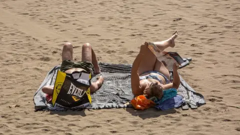 Getty Images Tourists in Spain