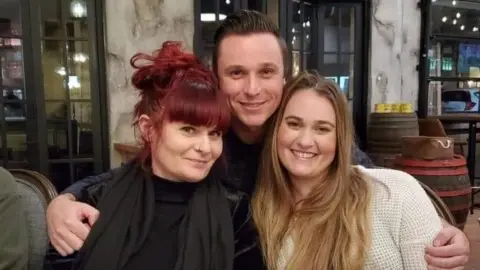 Nadine Beasley Nadine Beasley with a man and a woman