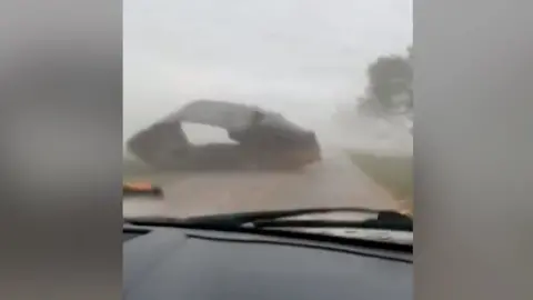 Object in front of car windscreen