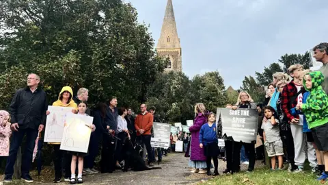 John Fairhall/BBC Protesters at a church in Birch, Colchester