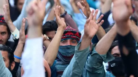 EPA Supporters of Pashtun Tahaffuz Movement (PTM) shout slogans during a protest against the arrest of one of their leader Alamzeb Mehsud in Karachi, Pakistan, 23 January 2019.