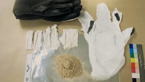 National Crime Agency Glove with concealed drugs
