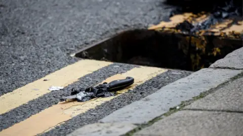Reuters A knife was recovered by the police from a drain following the stabbings