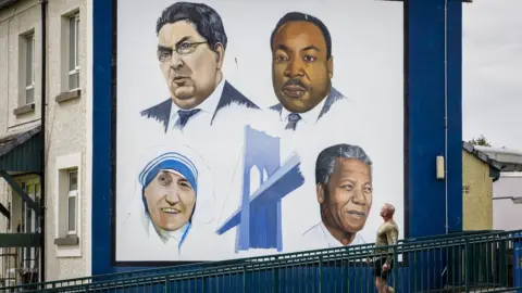 Liam McBurney A mural of John Hume with Mother Theresa, Martin Luther King and Nelson Mandela in Derry